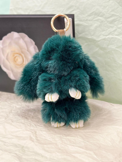Mīksts un pūkains atslēgu piekariņš 